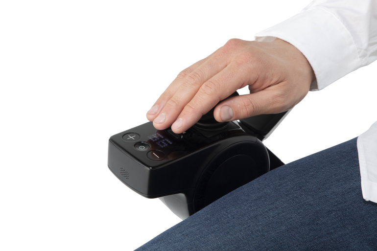 Control in use view of whill c2 portable power chair