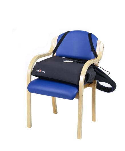 image of sitnstand compact on a chair