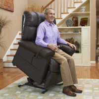 Man rising to stand in lift chair