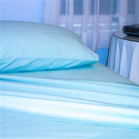 Sheets and pillows for homecare beds